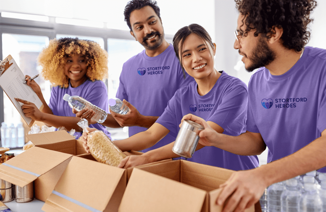 Stortford Heroes Volunteers Packing Food For Food Bank