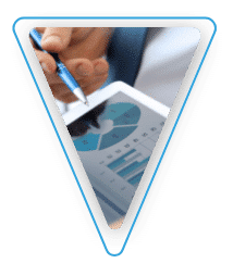A person pointing at graphs on a screen with a pen.