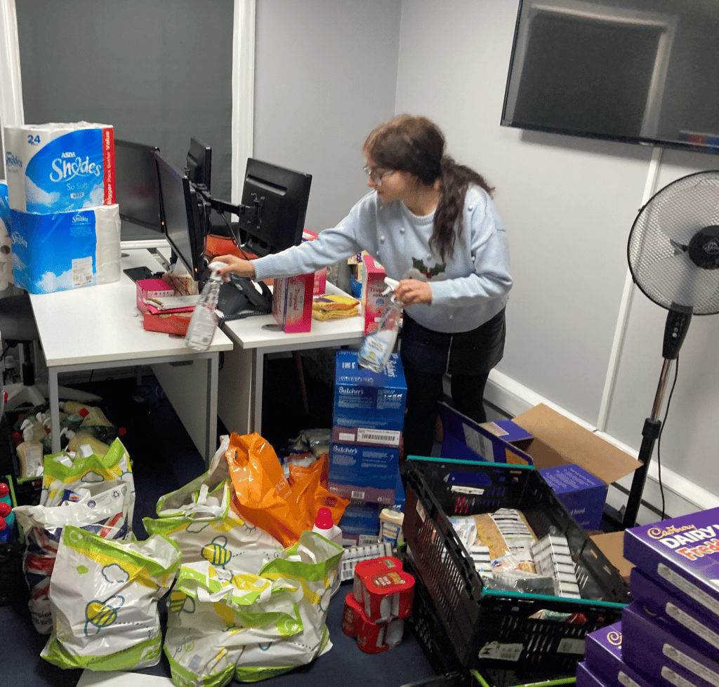 ITVET employee preparing 12 Days of Giving donations.