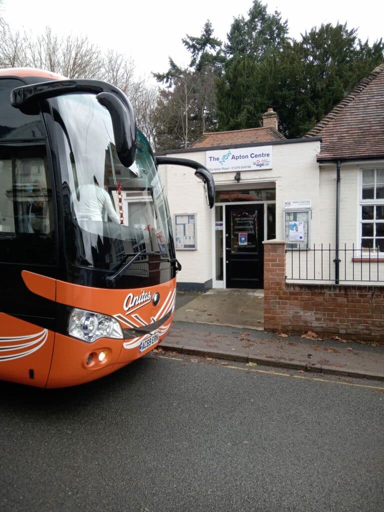 A bus picking up people from The Apton Centre to take them to their Christmas lunch.