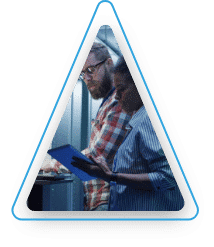 Two people looking at a tablet.