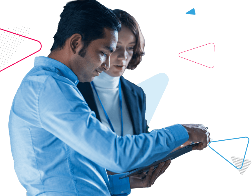 A man and woman looking at a tablet screen.