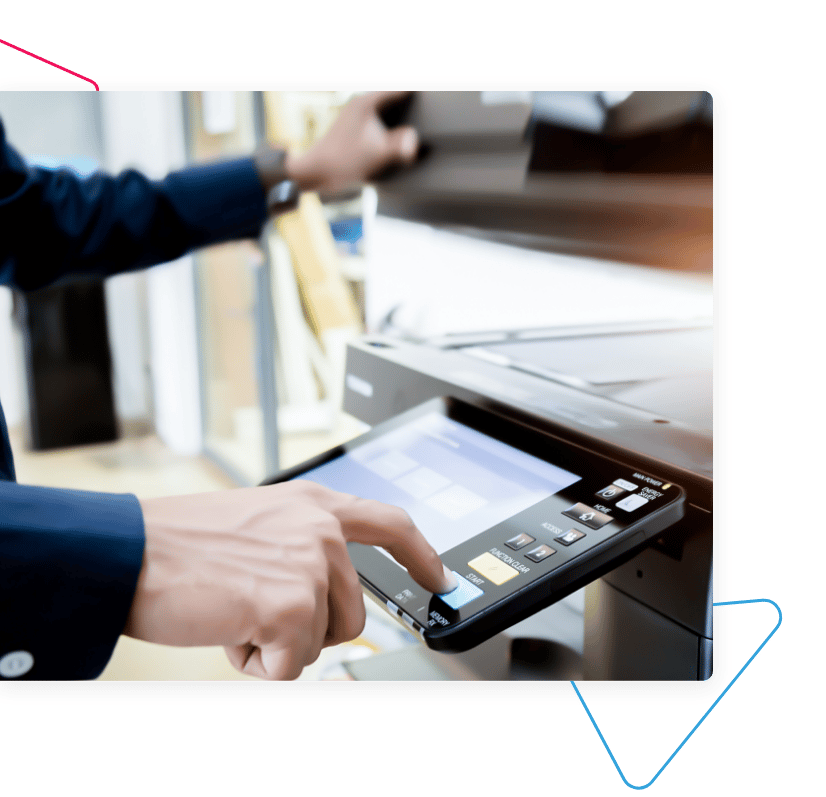 A man using a printer.